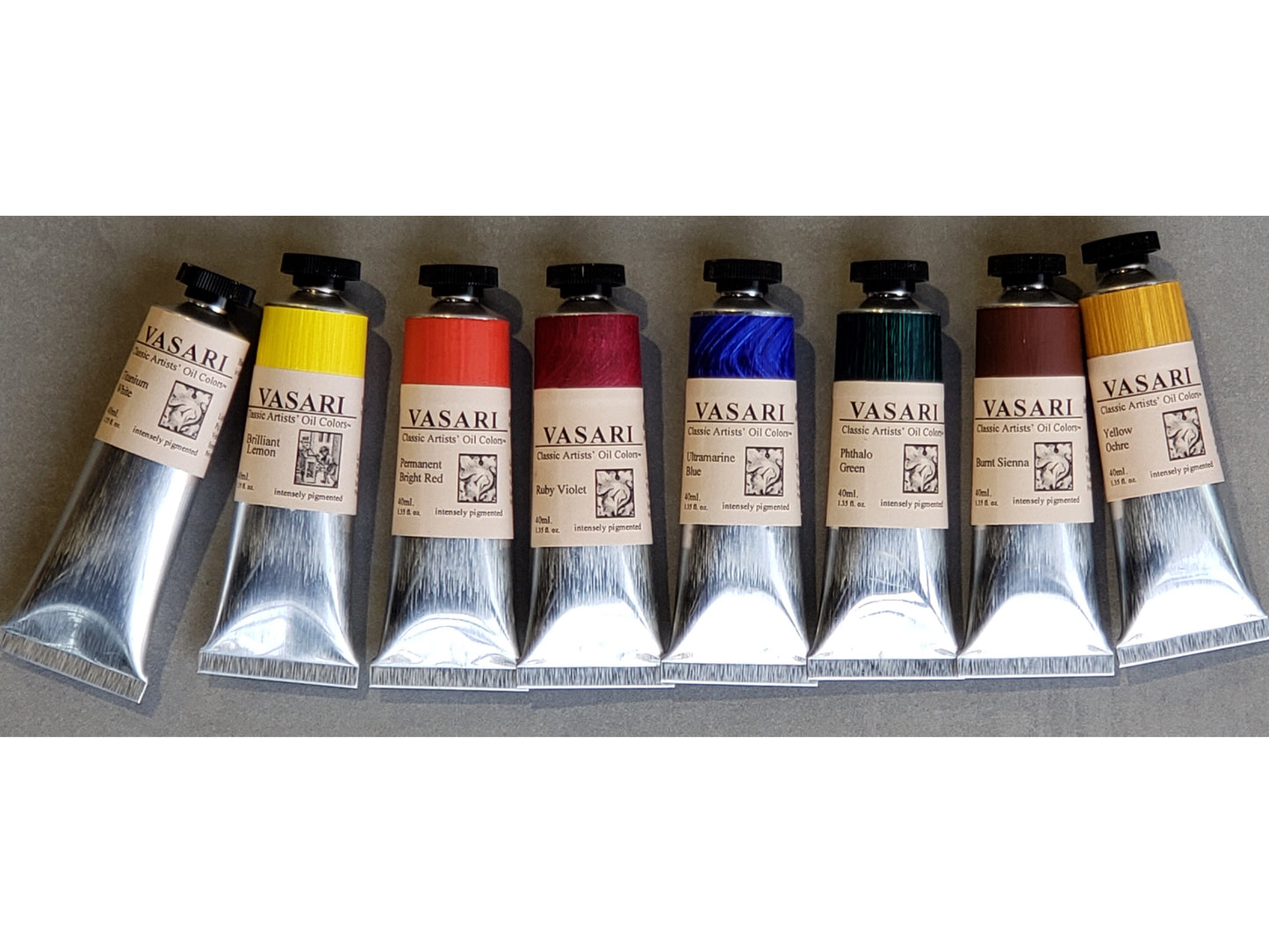 Our Elemental Paint Set of Titanium White with primary colors and two earths, chosen to mix for any style or subject.