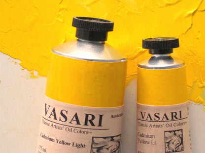 Cadmium Yellow Light shown with Large 175ml tube at left and small 40ml tube at right, both above Cadmium Yellow Light right from the tube, with some white added at center just above the tubes.